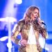 Celine Dion  Beauty comes out when starting out with a gold-colored casual jacket and pants